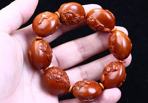 橄欖核手串怎么穿繩打結(jié)_橄欖核手串編織繩穿法_橄欖核手串怎么穿繩